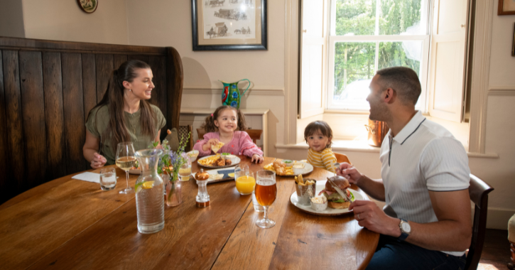 family eating lunch inside High Force Hotel
